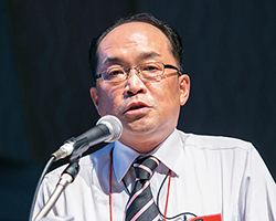 株式会社ファミリーマート オフィサー システム本部 システムソリューション 部長 田中 栄一氏